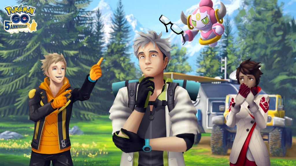 Hoopa, Professor Willow, Spark and Candela stand on a meadow