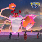 This image shows Gigantamax Kingler emerging from the ocean, next to a Power Spot, while a group of Pokémon GO Trainers stand on the beach with smartphones in hand, ready to battle it.