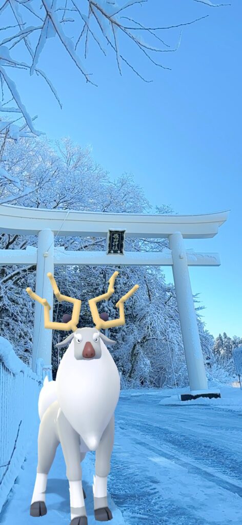 A Wyrdeer stands in front of a Torii, a traditional Japanese gate typically found at a Shiinto shrine, in the snow