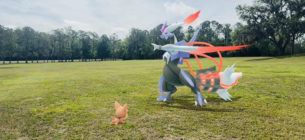 A white kyurem faces off against lillipup