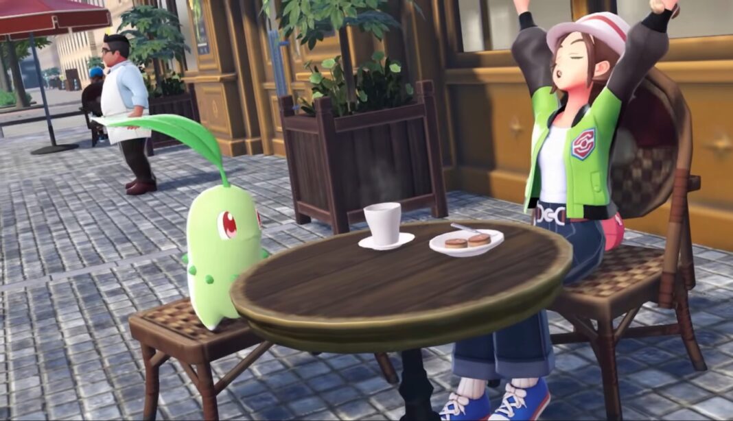 The trainer and her chikorita sitting near a coffee table
