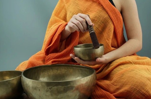 a monk using a tibetan monk